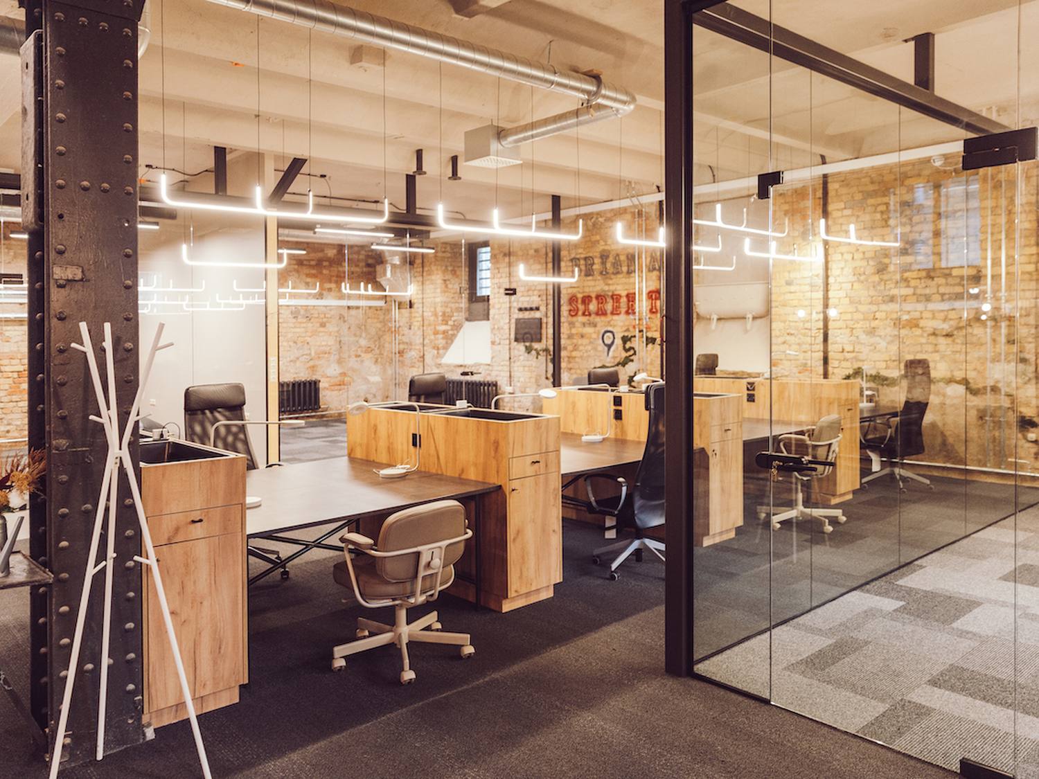 Coworking desks and glass meeting room at Double9